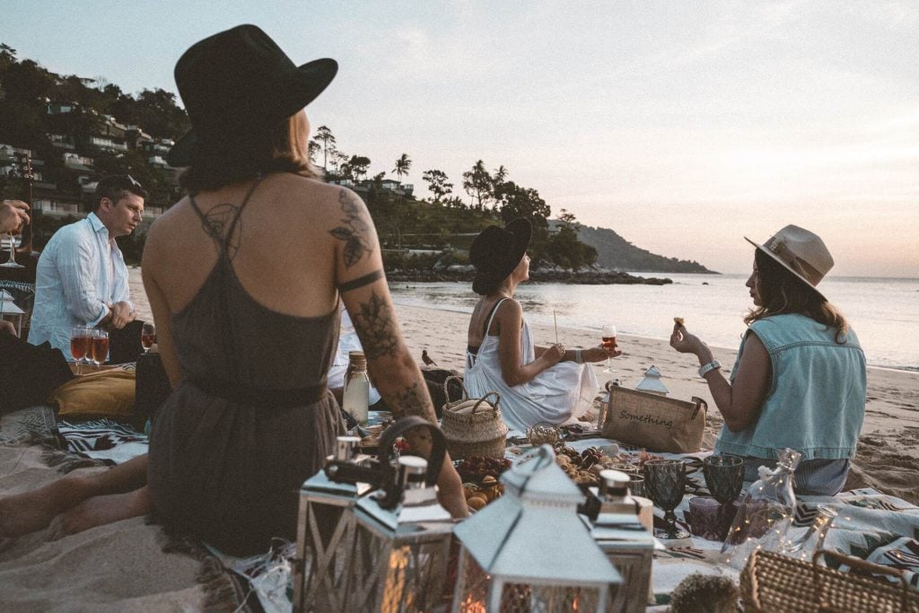 People having a picnic on the beach 
