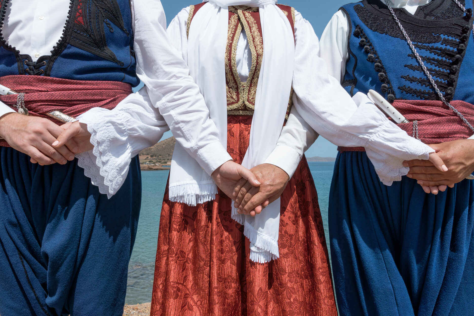 People wearing traditional Greek costumes