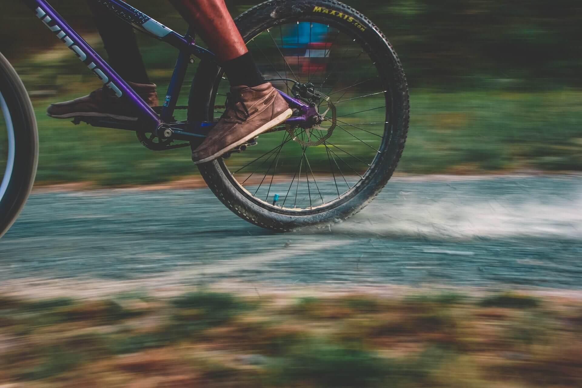 Person writing a mountain bike