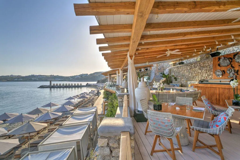 View of a beach bar and the sunbeds 