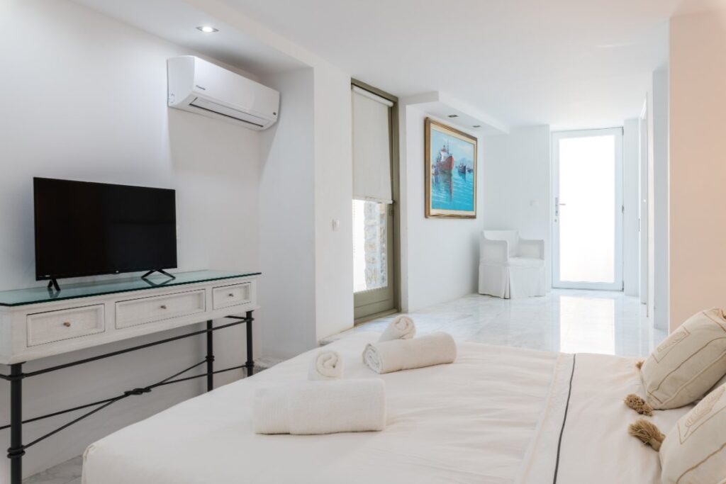 Cozy bedroom in the top Mykonos villa for rent.