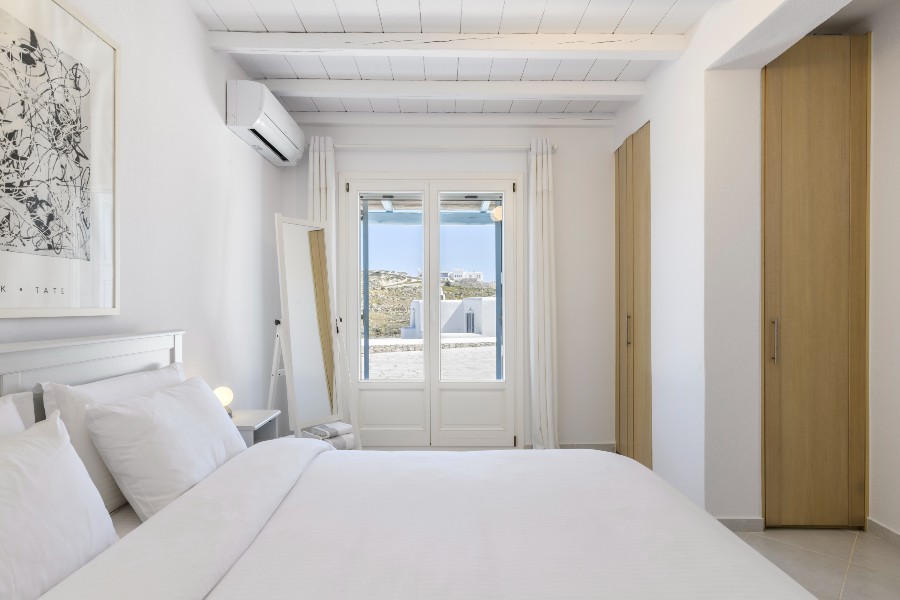 Bedroom with a view in Mykonos lavish villa for rent.