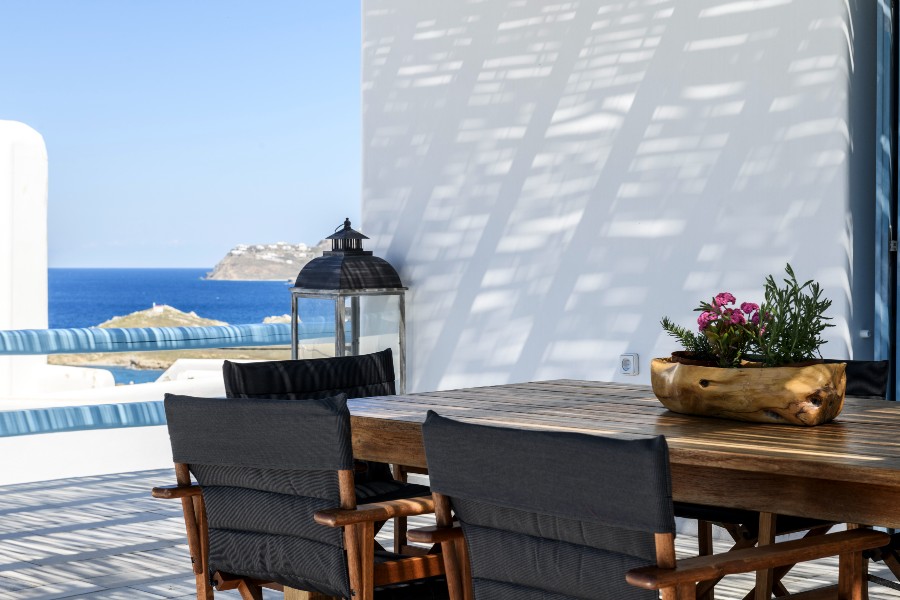 Dining space outside of Mykonos lavish villa for rent.