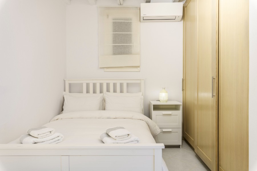 Cozy bedroom in the finest Mykonos villa for rent.