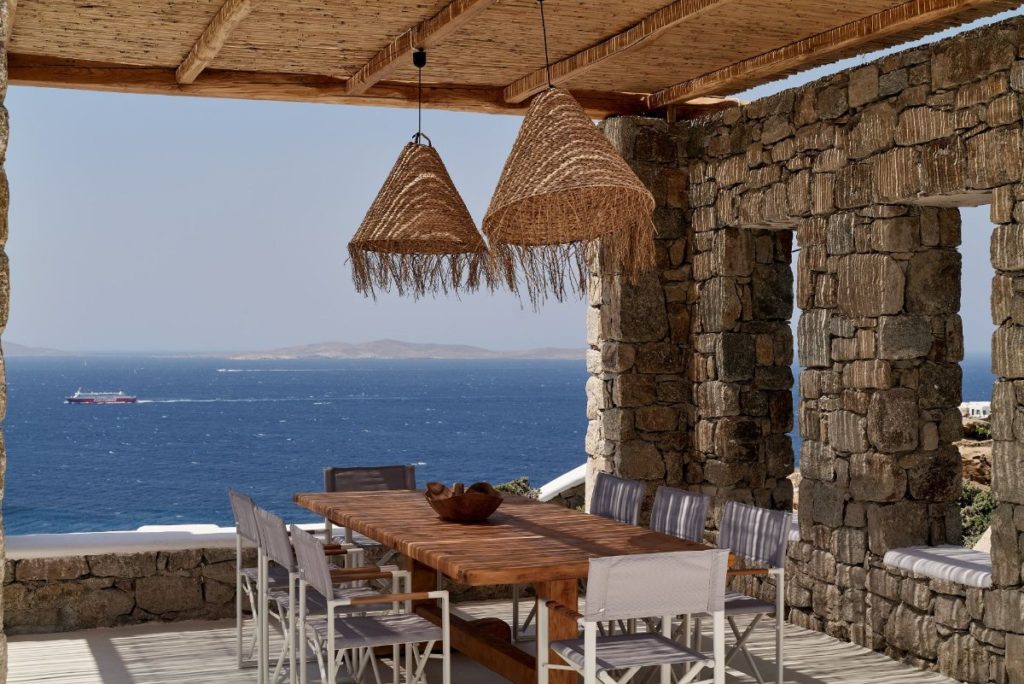 Have lunch at the best Mykonos villa for rent, with a stunning sea view.