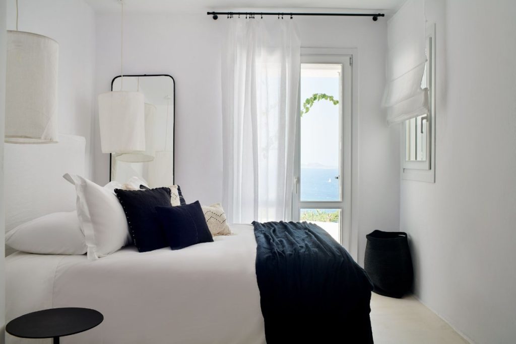 Comfy and modern bedroom in Mykonos best villa to stay in.