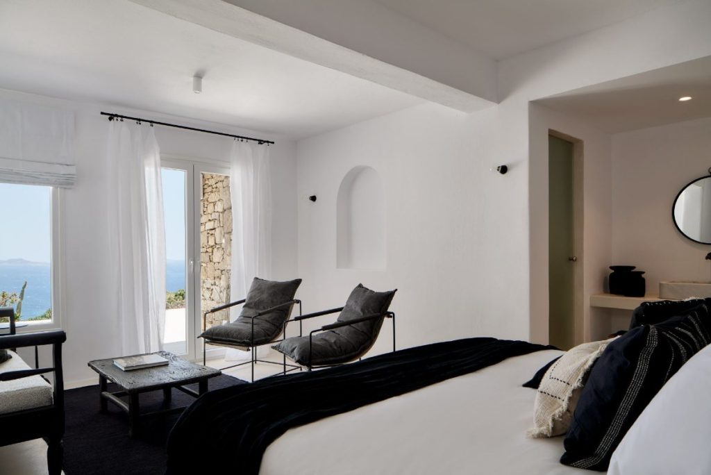 Comfy bedroom in Mykonos rental villa.