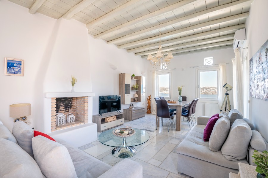 Spacious living room in a luxurious Mykonos villa for rent.