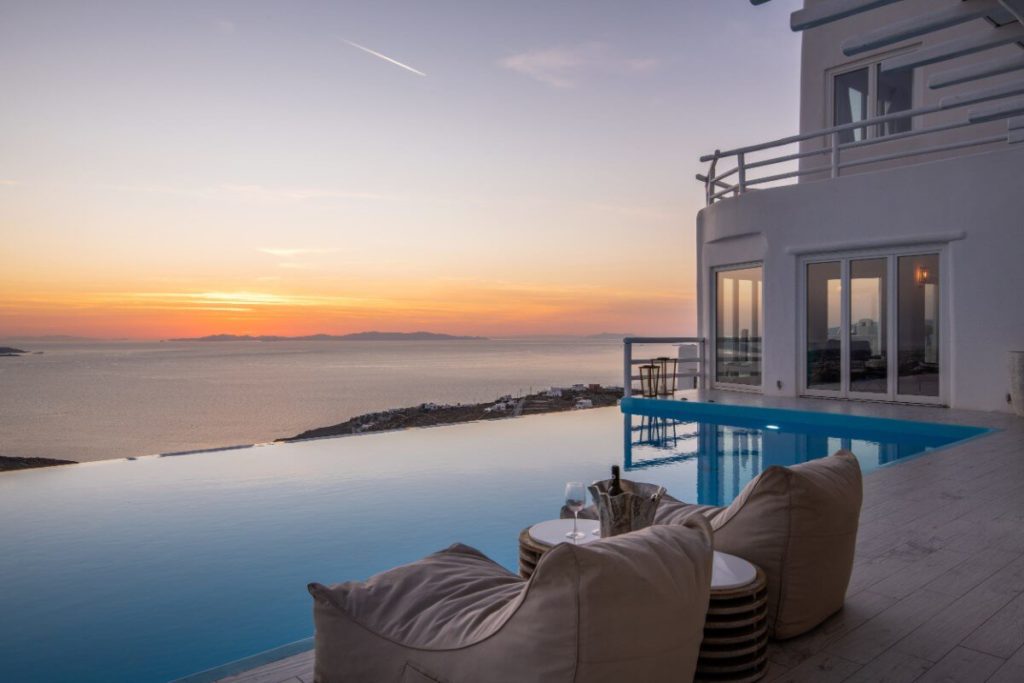 Sunset by the pool in the most lavish villa for rent, Mykonos.