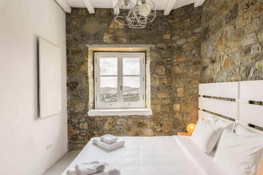 Comfy bedroom in the best Mykonos villa for rent.