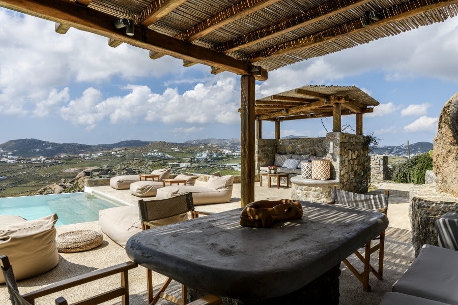 Mykonos villa with a private pool and the Aegean sea view, available for rent.
