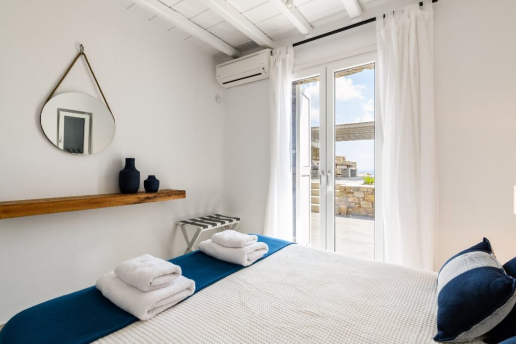 Top Mykonos villa for rent and its bedroom.