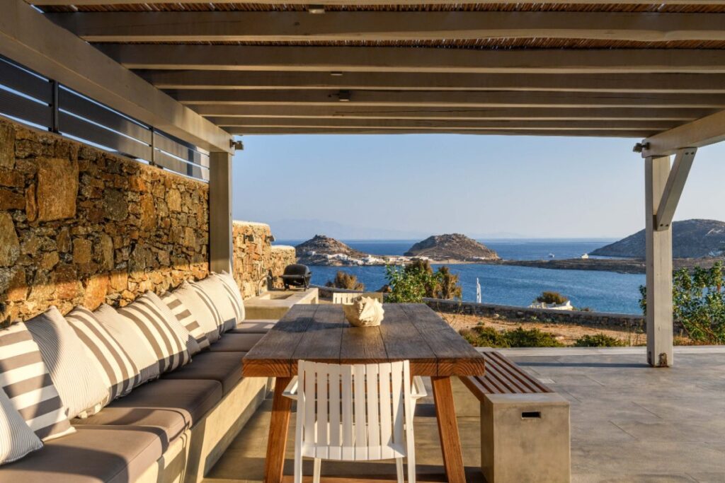 Waterfront villa with a perfect terrace, available for booking, Mykonos.