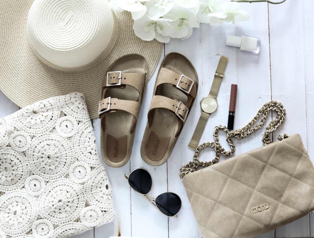 A hat, sandals, and a bag