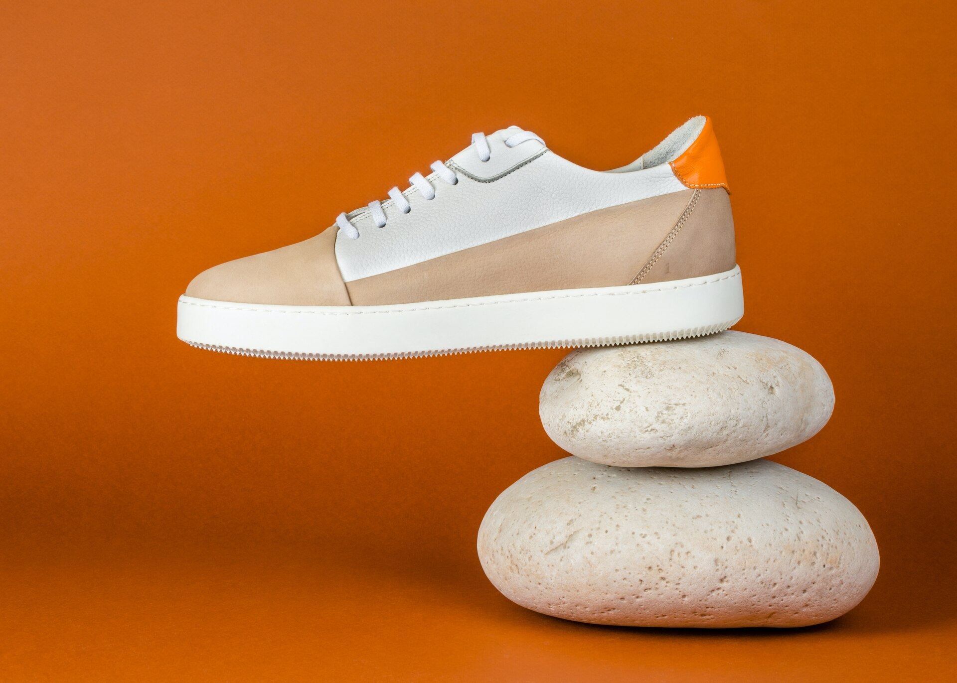 A sneaker on rocks
