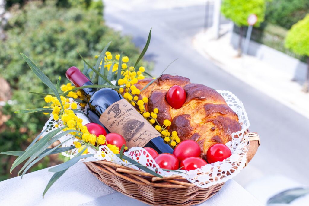 basket with a bottle of wine