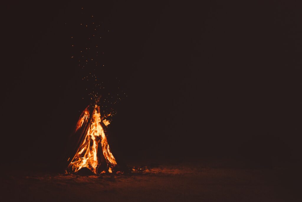 A bonfire on a beach 