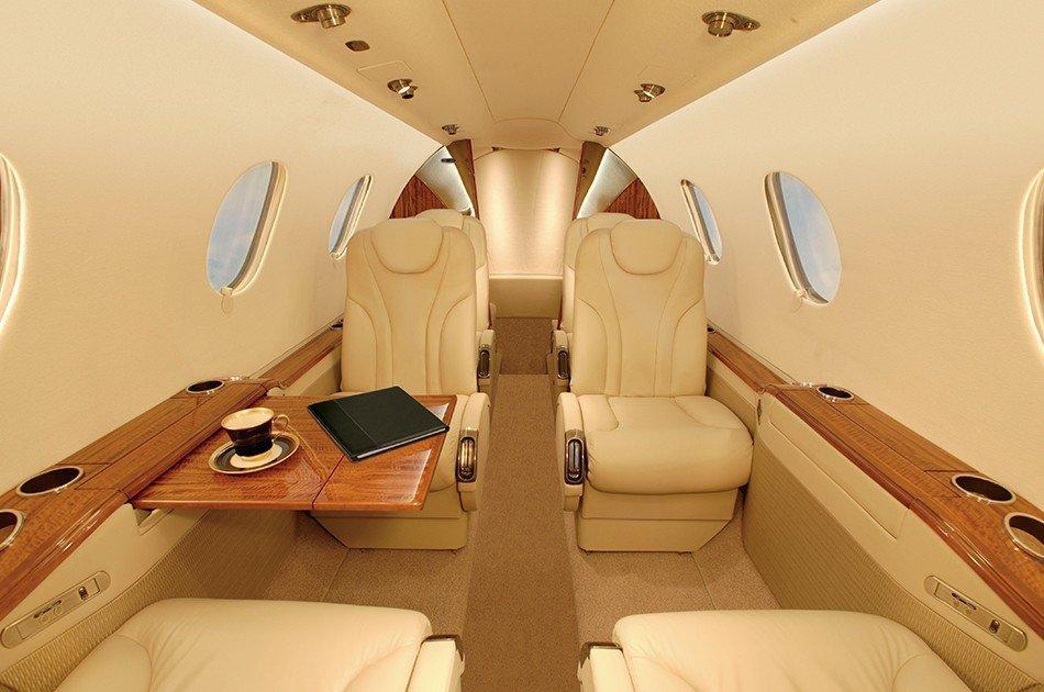 jet interior with wooden table to drink tea and relax