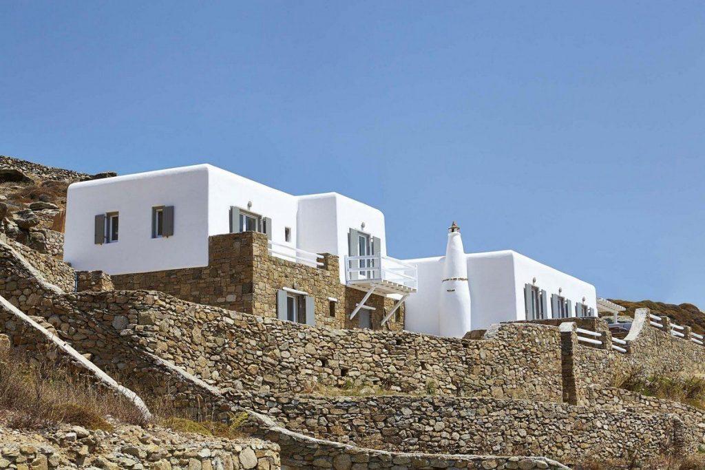 Villa Valery, Fanari, Mykonos, exterior, white buildings, stone walls, balcony, nature