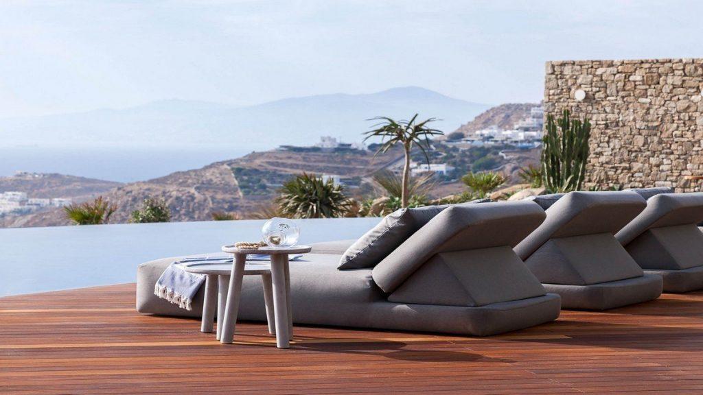 Villa Aphrodite, Agia Sofia, Mykonos, swiming pool, sunbeds, coffee table, nature, palm tree, panoramic view