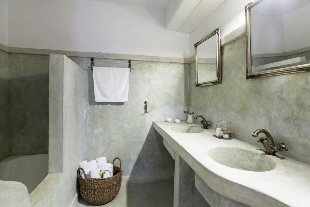 bathroom with shower and towel rack