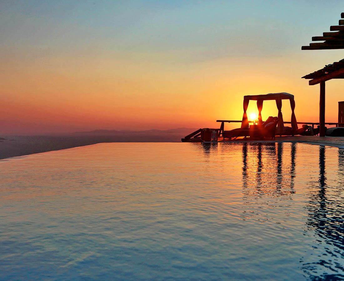 Sunset at a Mykonos villa with a pool