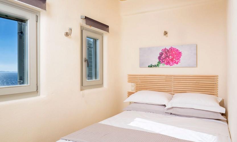 Villa_Apollo_32.jpg Choulakia Mykonos 4th Bedroom, paint, bed, pillows, lamp, windows