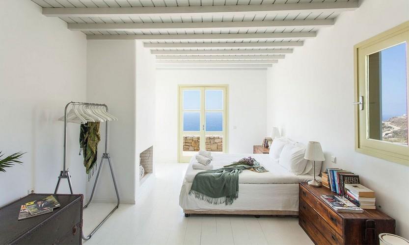 Villa_Cynthia_27.jpg Fanari Mykonos 2nd Bedroom, double bed, pillows, windows, book, lamp