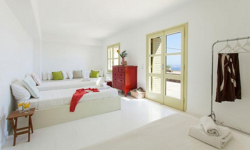 Villa_Cynthia_34.jpg Fanari Mykonos 6th Bedroom, bed, pillows, towels, water, night table