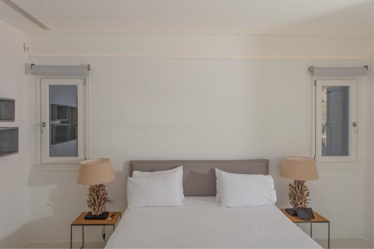 Villa_Nika_20.jpg Tourlos Mykonos 4th Bedroom, double bed, pillows, lamp, night table