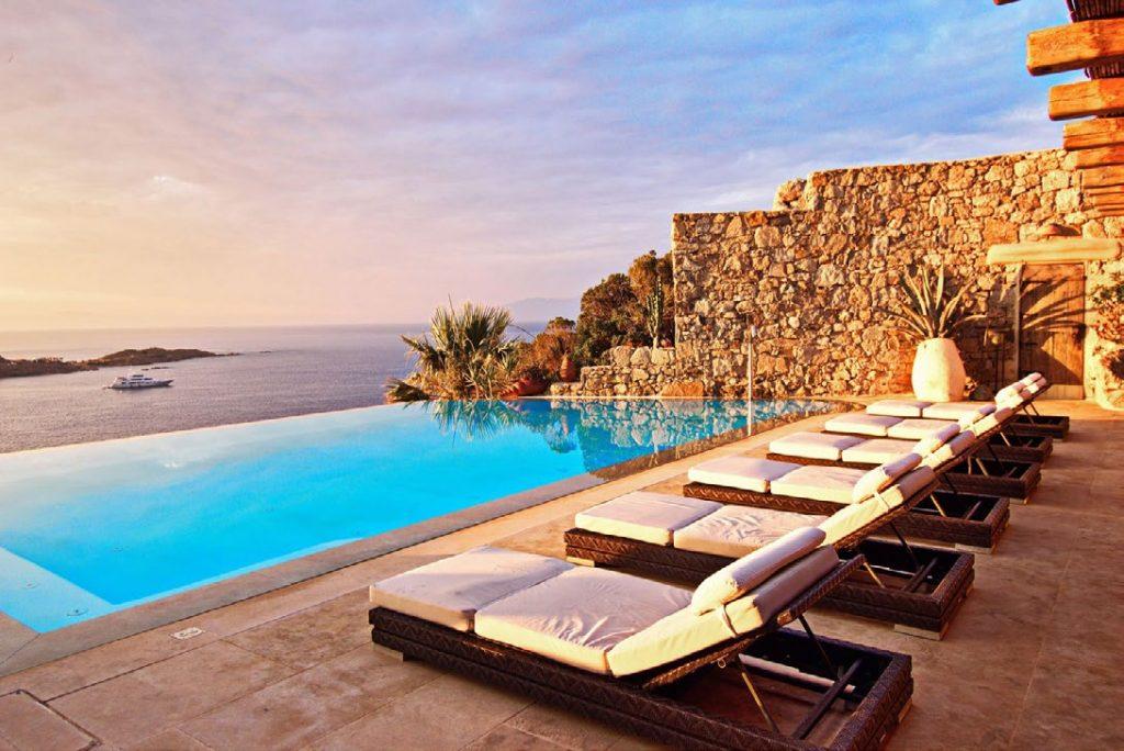 Villa Felicia Agios Lazaros Mykonos, outdoor, sun beds, pool, sea, sky, clouds, boat