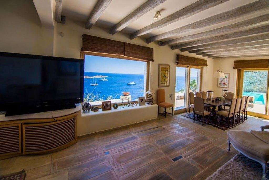 Villa Felicia Agios Lazaros Mykonos, living room, flat screen TV, window, sea view, boats