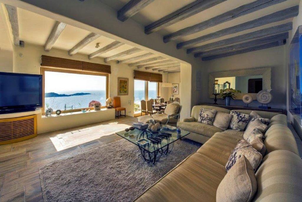 Villa Felicia Agios Lazaros Mykonos, living room, sofa, pillows, table, flat screen TV
