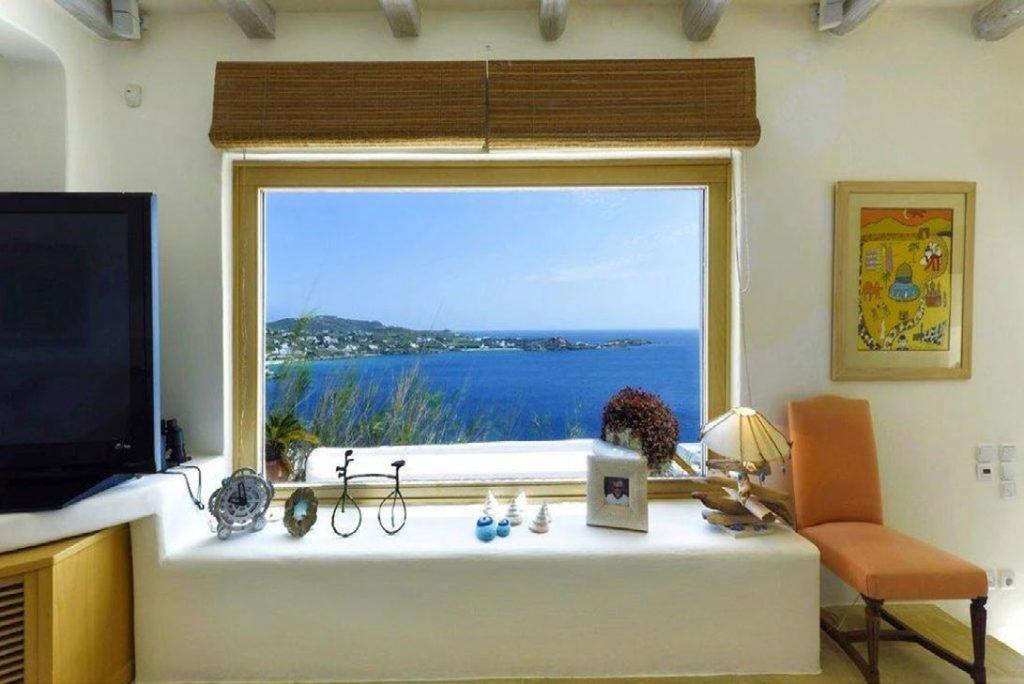 Villa Felicia Agios Lazaros Mykonos, living room, flat screen TV, chair, picture, painting