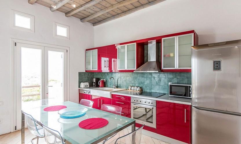 Villa_Zephyr2_17.jpg Super Paradise Mykonos Kitchen, microwave, fridge, oven, table, chairs, vase
