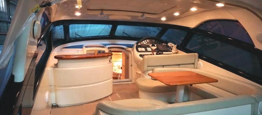 Yacht Baia Azura Mykonos, yacht interior, wheel, table, sofa