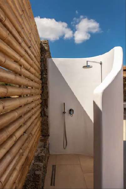 outer part with shower and white wall