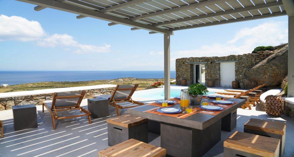 outdoor dining area with breathtaking sea horizon view