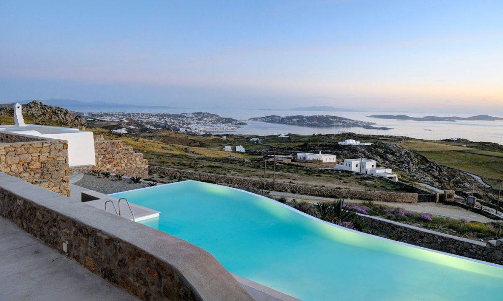 Villa Gianna, Fanari, Mykonos, Pool, Sky, White villa, Sunbeds, Stone wall, Plants, Sunset, Sea view, Sea, Towels