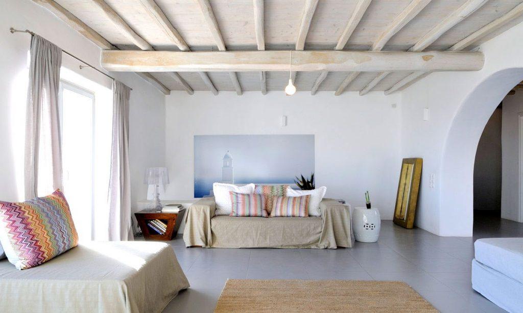 Villa Gianna, Fanari, Mykonos, Sofa, Pillows, Pictures, Lamps, Windows, White walls