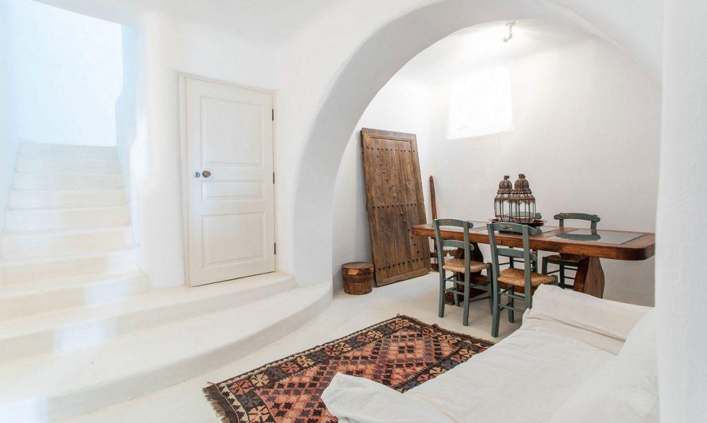 living area with a beautifully designed rug and old door