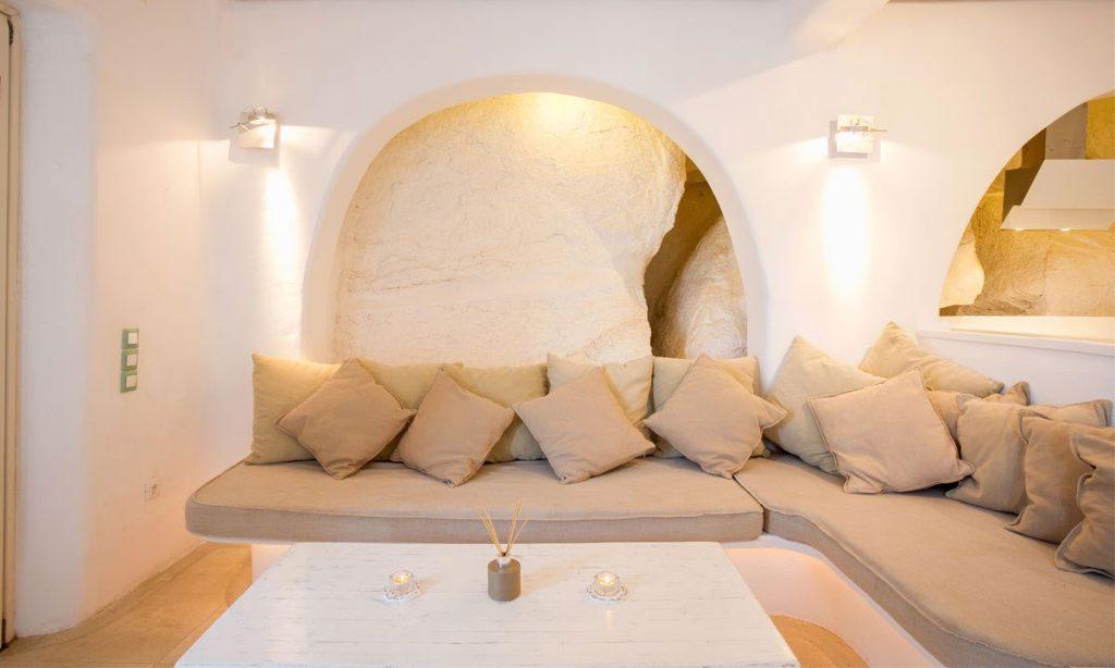 Villa Ida, Super Paradise, Mykonos, Pillows, Curtains, Stone wall, Door, Table, Lamps, Living room, Candels
