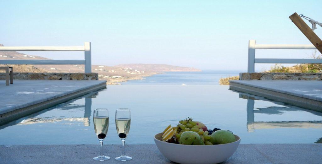 Villa-Ragnar_08.jpg Kalafatis Mykonos, outdoor, sea, sky, wine, glasses, fruits, bowl, pool