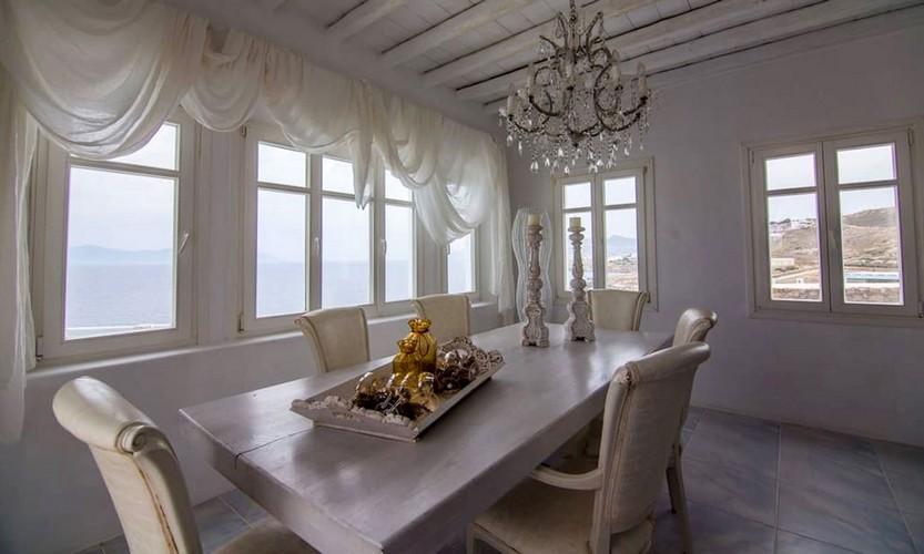 Villa_Eli_18.jpg Agios Ioannis Mykonos Dining area, table, chairs, lamp, curtains