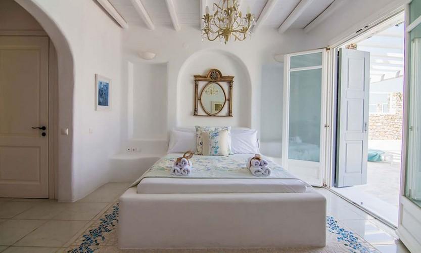 Villa_Eli_24.jpg Agios Ioannis Mykonos 5th Bedroom, bed, pillows, towels, door, paint, terrace