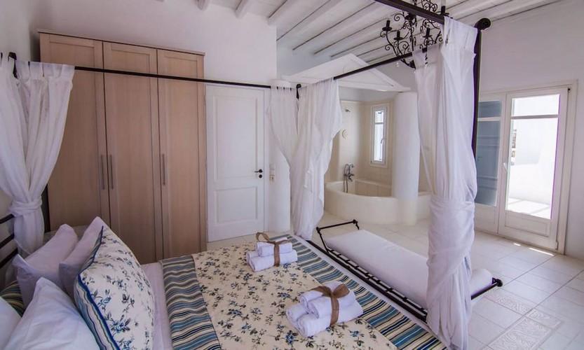 Villa_Eli_29.jpg Agios Ioannis Mykonos 2nd Bedroom, bed, pillows, towels, curtains, shower, cabinet