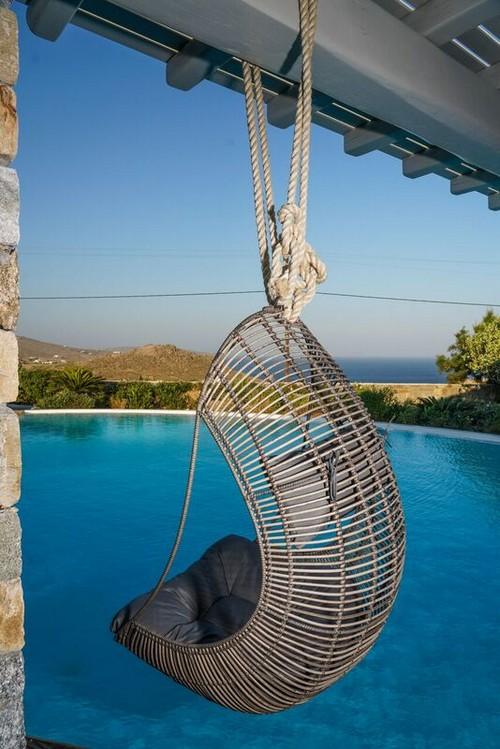 outdoor area with a lounger hanging from the chandelier