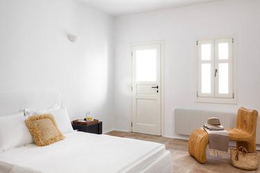 Villa_Jolly_11.jpg Agios Lazaros Mykonos 5th Bedroom, bed, pillows, chair hat, door, window