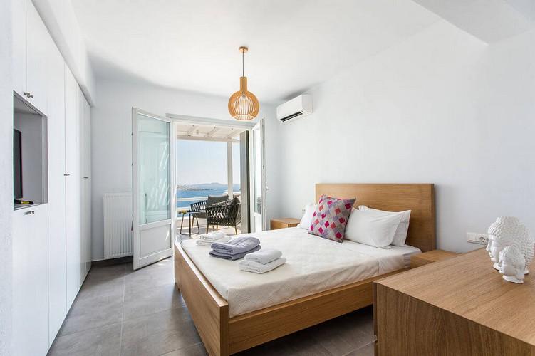 Villa_Kim_10.jpg Agios Stefanos Mykonos 2nd Bedroom, bed, pillows, towels, air condition, flat screen tv