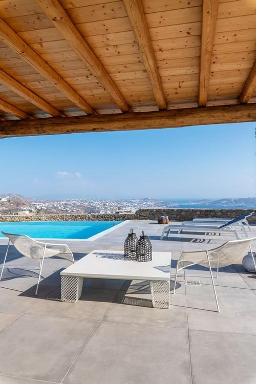 Villa_Madona_12.jpg Tourlos Mykonos Outdoor, pool, table, chairs, vase, sky